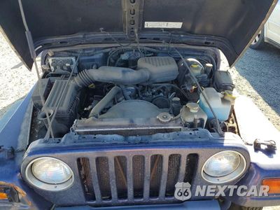 Zdjęcie 12 z 13 samochodu: 1999 JEEP WRANGLER VIN:1J4FY29P7XP447158 - miniatura