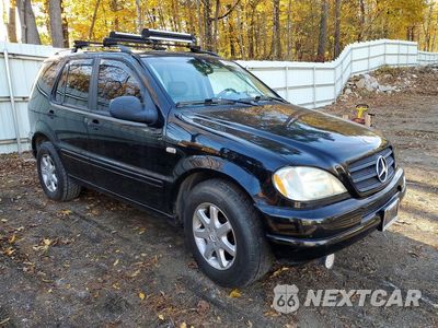Czwarte zdjęcie samochodu z boku: 1999 MERCEDES-BENZ ML 430 VIN:4JGAB72E0XA121787 - miniatura