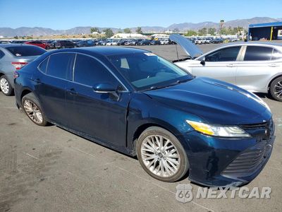 Czwarte zdjęcie samochodu z boku: 2018 TOYOTA CAMRY HYBRID XLE VIN:4T1B21HK5JU506749 - miniatura