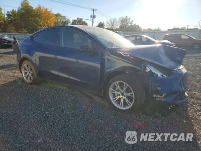 Czwarte zdjęcie samochodu z boku: 2023 TESLA MODEL Y VIN:7SAYGDED7PF934852 - miniatura