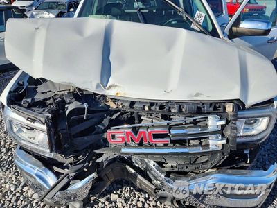 Zdjęcie 11 z 12 samochodu: 2018 GMC SIERRA K1500 SLT VIN:3GTU2NEC6JG295078 - miniatura