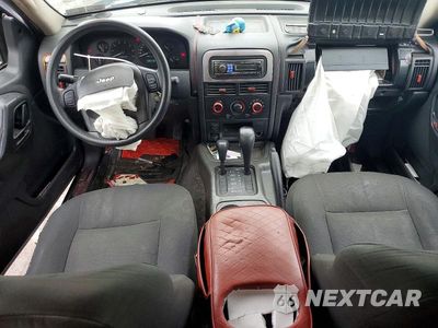 Zdjęcie 8 z 13 samochodu: 2004 JEEP GRAND CHEROKEE LAREDO VIN:1J4GW48S74C333756 - miniatura