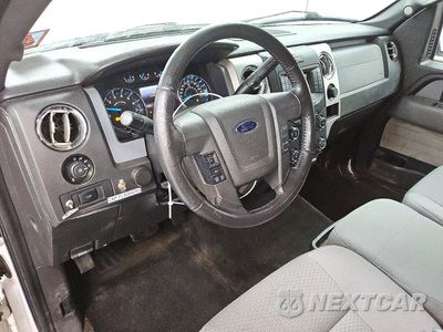 Zdjęcie 8 z 13 samochodu: 2014 FORD F150 VIN:1FTMF1CM5EKD18020 - miniatura