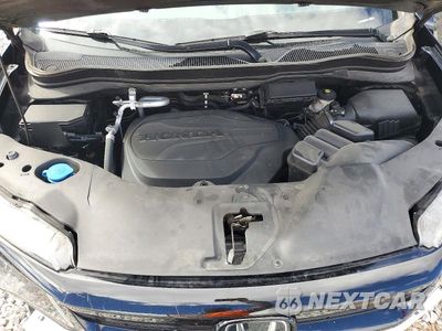 Zdjęcie 12 z 14 samochodu: 2021 HONDA PILOT SE VIN:5FNYF5H29MB004365 - miniatura