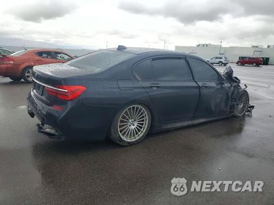 Trzecie zdjęcie samochodu z tyłu: 2016 BMW 740 I VIN:WBA7E2C55GG738846 - miniatura