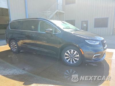 Czwarte zdjęcie samochodu z boku: 2023 CHRYSLER PACIFICA HYBRID TOURING L VIN:2C4RC1L71PR559053 - miniatura