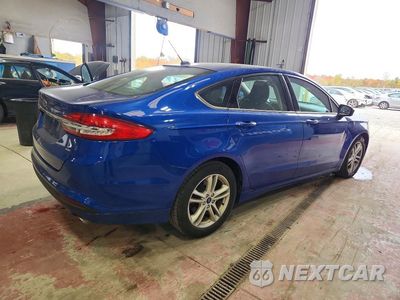 Trzecie zdjęcie samochodu z tyłu: 2018 FORD FUSION SE VIN:3FA6P0H7XJR108222 - miniatura