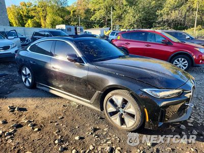 Czwarte zdjęcie samochodu z boku: 2023 BMW I4 EDRIVE 35 VIN:WBY43AW0XPFR41824 - miniatura