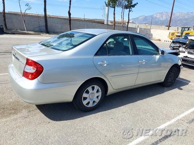 Trzecie zdjęcie samochodu z tyłu: 2003 TOYOTA CAMRY LE VIN:JTDBE32K030147000 - miniatura
