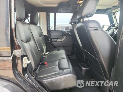 Zdjęcie 11 z 13 samochodu: 2013 JEEP WRANGLER UNLIMITED SAHARA VIN:1C4HJWEG5DL580603 - miniatura