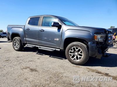 Czwarte zdjęcie samochodu z boku: 2016 GMC CANYON SLE VIN:1GTG6CE39G1356971 - miniatura