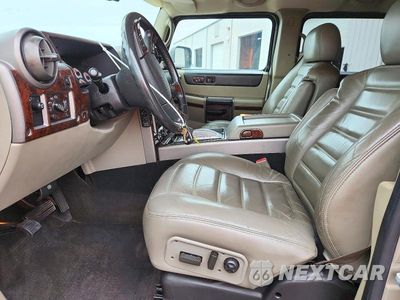 Zdjęcie 7 z 13 samochodu: 2003 HUMMER H2 VIN:5GRGN23U63H137636 - miniatura