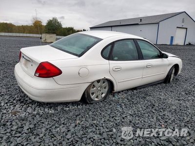 Trzecie zdjęcie samochodu z tyłu: 2003 FORD TAURUS LX VIN:1FAFP52223A154229 - miniatura