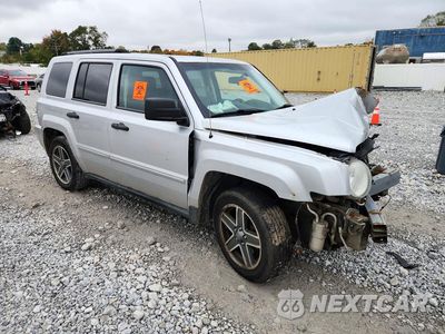 Czwarte zdjęcie samochodu z boku: 2009 JEEP PATRIOT LIMITED VIN:1J4FT48B29D196604 - miniatura
