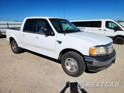 Czwarte zdjęcie samochodu z boku: 2003 FORD F150 SUPERCREW VIN:1FTRW07653KC39987 - miniatura