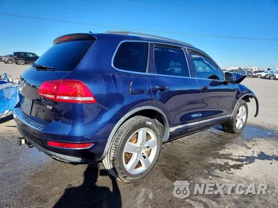 Trzecie zdjęcie samochodu z tyłu: 2013 VOLKSWAGEN TOUAREG V6 VIN:WVGEF9BP9DD010670 - miniatura