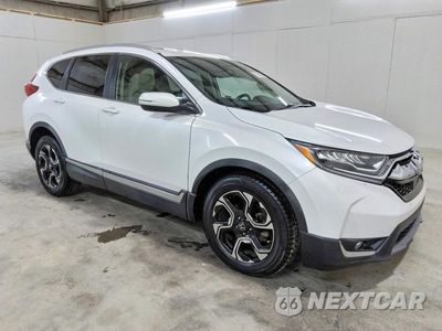 Czwarte zdjęcie samochodu z boku: 2019 HONDA CR-V TOURING VIN:7FARW1H96KE013651 - miniatura