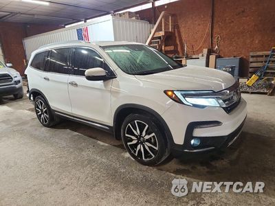 Czwarte zdjęcie samochodu z boku: 2020 HONDA PILOT TOURING VIN:5FNYF6H60LB034264 - miniatura
