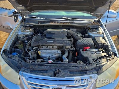 Zdjęcie 11 z 12 samochodu: 2007 KIA SPECTRA LX VIN:KNAFE121775431758 - miniatura