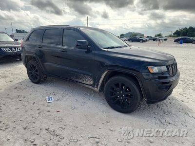 Czwarte zdjęcie samochodu z boku: 2018 JEEP GRAND CHEROKEE LAREDO VIN:1C4RJFAGXJC123758 - miniatura
