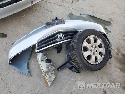 Zdjęcie 13 z 14 samochodu: 2002 HONDA ODYSSEY EX VIN:2HKRL18612H588672 - miniatura