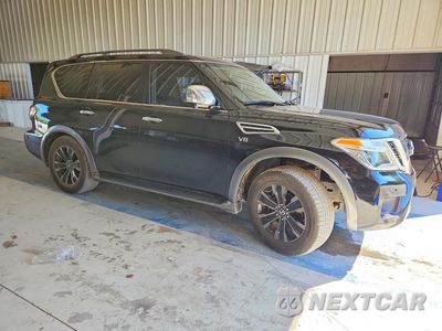 Czwarte zdjęcie samochodu z boku: 2017 NISSAN ARMADA PLATINUM VIN:JN8AY2NFXH9300422 - miniatura