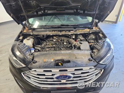 Zdjęcie 12 z 13 samochodu: 2022 FORD EDGE TITANIUM VIN:2FMPK4K96NBA55727 - miniatura