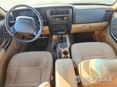 Zdjęcie 8 z 12 samochodu: 2000 JEEP CHEROKEE SPORT VIN:1J4FF48S5YL247105 - miniatura