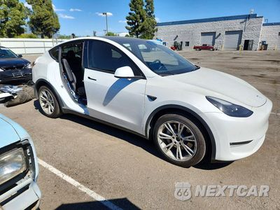 Czwarte zdjęcie samochodu z boku: 2023 TESLA MODEL Y VIN:7SAYGDEE2PF793326 - miniatura