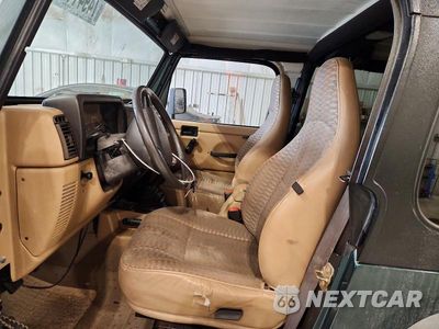 Zdjęcie 7 z 13 samochodu: 2000 JEEP WRANGLER / TJ SPORT VIN:1J4FA49S3YP755062 - miniatura