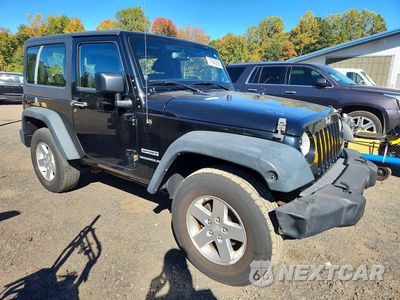 Czwarte zdjęcie samochodu z boku: 2014 JEEP WRANGLER SPORT VIN:1C4AJWAG3EL296010 - miniatura