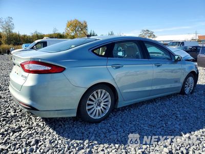 Trzecie zdjęcie samochodu z tyłu: 2013 FORD FUSION SE PHEV VIN:3FA6P0PUXDR233703 - miniatura