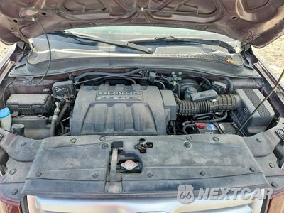 Zdjęcie 11 z 12 samochodu: 2007 HONDA PILOT LX VIN:2HKYF18157H540557 - miniatura