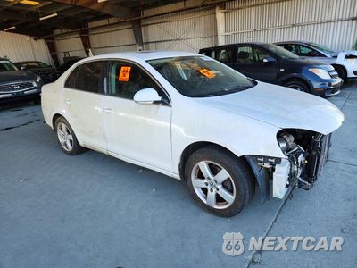 Czwarte zdjęcie samochodu z boku: 2009 VOLKSWAGEN JETTA VIN:3VWRZ71K89M043207 - miniatura