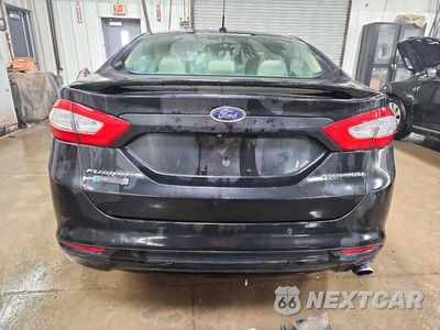 Zdjęcie 6 z 12 samochodu: 2015 FORD FUSION TITANIUM PHEV VIN:3FA6P0SU0FR201109 - miniatura