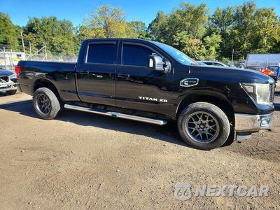 Czwarte zdjęcie samochodu z boku: 2018 NISSAN TITAN XD SV VIN:1N6BA1F47JN529940 - miniatura