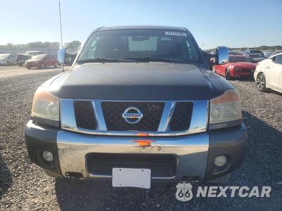 Piąte zdjęcie samochodu w środku: 2011 NISSAN TITAN SV VIN:1N6BA0EC6BN320371 - miniatura
