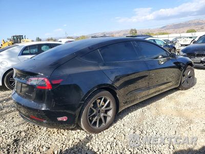 Trzecie zdjęcie samochodu z tyłu: 2022 TESLA MODEL 3 VIN:5YJ3E1EB5NF363112 - miniatura