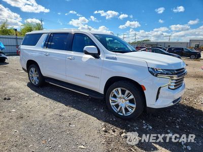 Czwarte zdjęcie samochodu z boku: 2021 CHEVROLET SUBURBAN K1500 HIGH COUNTRY VIN:1GNSKGKL8MR416616 - miniatura