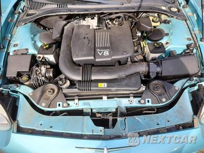 Zdjęcie 11 z 12 samochodu: 2002 FORD THUNDERBIRD VIN:1FAHP60A22Y123822 - miniatura