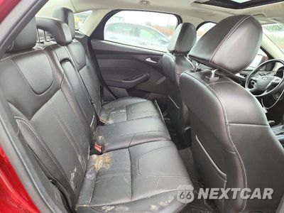Zdjęcie 10 z 12 samochodu: 2014 FORD FOCUS TITANIUM VIN:1FADP3J24EL215133 - miniatura