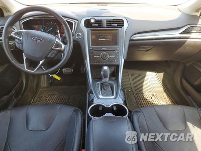 Zdjęcie 8 z 13 samochodu: 2016 FORD FUSION TITANIUM PHEV VIN:3FA6P0SU1GR141911 - miniatura