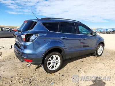 Trzecie zdjęcie samochodu z tyłu: 2018 FORD ESCAPE SE VIN:1FMCU0GD0JUB44311 - miniatura