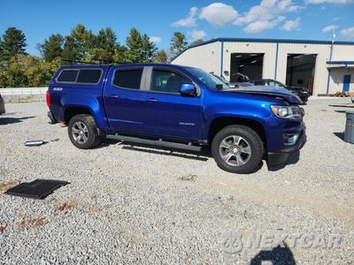 Czwarte zdjęcie samochodu z boku: 2016 CHEVROLET COLORADO Z71 VIN:1GCGTDE34G1296273 - miniatura