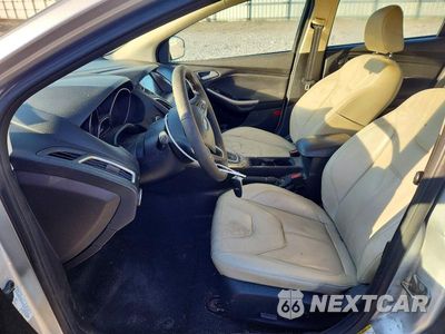 Zdjęcie 7 z 12 samochodu: 2017 FORD FOCUS TITANIUM VIN:1FADP3N28HL287595 - miniatura