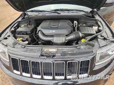Zdjęcie 12 z 13 samochodu: 2014 JEEP GRAND CHEROKEE LAREDO VIN:1C4RJFAGXEC478127 - miniatura