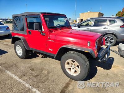 Czwarte zdjęcie samochodu z boku: 2002 JEEP WRANGLER / TJ SE VIN:1J4FA29P92P751878 - miniatura