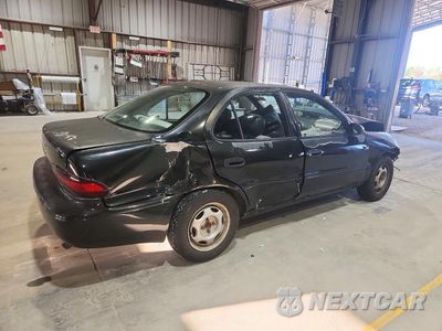 Trzecie zdjęcie samochodu z tyłu: 1997 GEO PRIZM BASE VIN:1Y1SK5264VZ430047 - miniatura