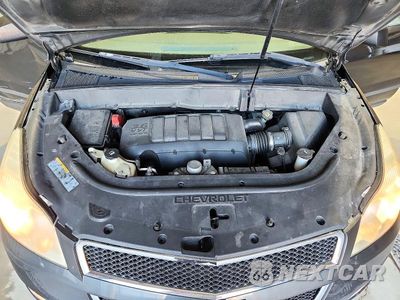 Zdjęcie 12 z 13 samochodu: 2011 CHEVROLET TRAVERSE LS VIN:1GNKVEED4BJ169445 - miniatura