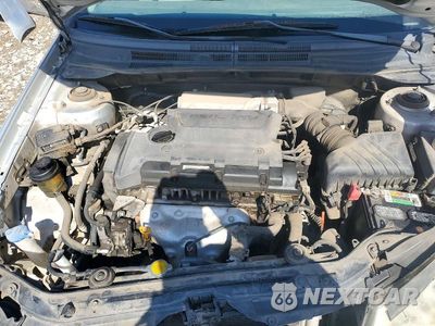 Zdjęcie 11 z 13 samochodu: 2009 KIA SPECTRA LX VIN:KNAFE221995624986 - miniatura